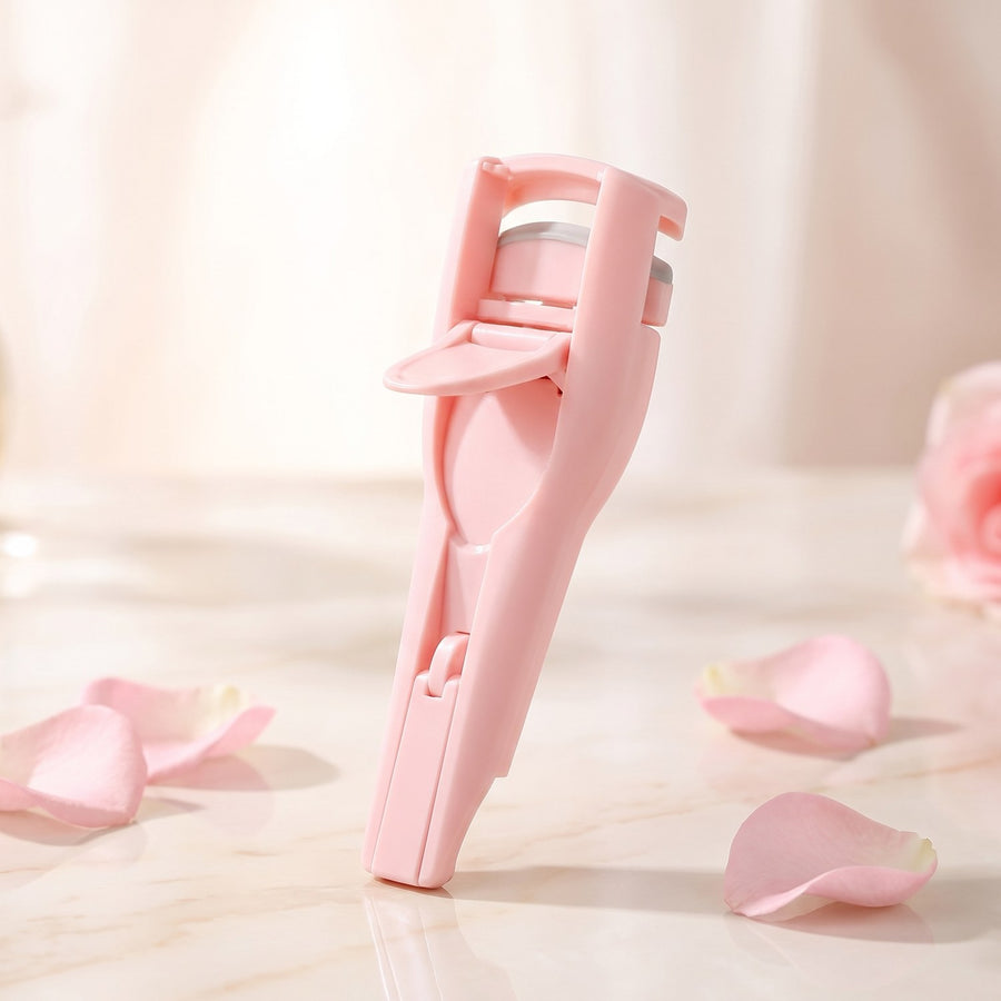 Recourbe-cils Cléolya rose poudré sur fond de marbre